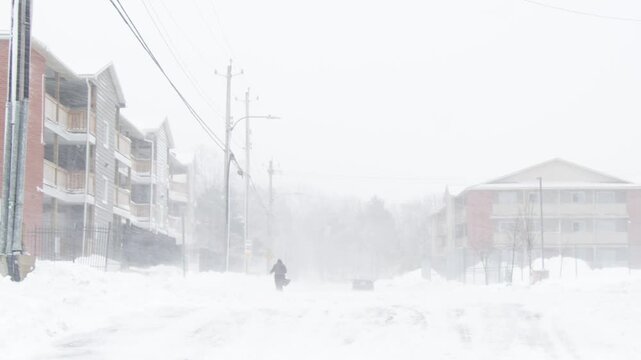 Massive Snow Storm In Dartmouth Nova Scotia With City Streets And Parked Cars Completely Buried Under Thick Snowdrifts. Extreme Winter Conditions In A Canadian Urban Area.
