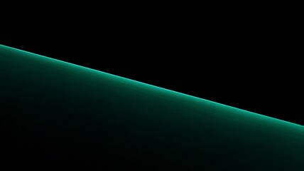 A vibrant green glow shines brightly against a dark background