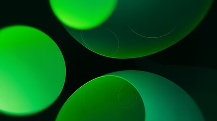 A close-up view of several green circles on a dark background