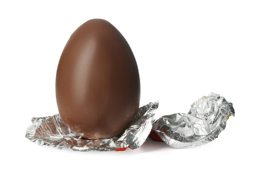 Chocolate egg with foil isolated on white. Happy Easter