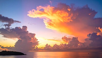 Stunning seascape, fiery sunset paints the clouds with vibrant orange and purple hues