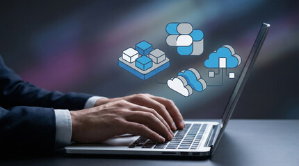 Businessman working with cloud computing icons on laptop
