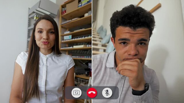 A man shows boredom during an online call. He looks away while a woman talks. The setting is a simple room with bookshelves in the background.