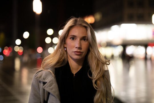 young woman in night city