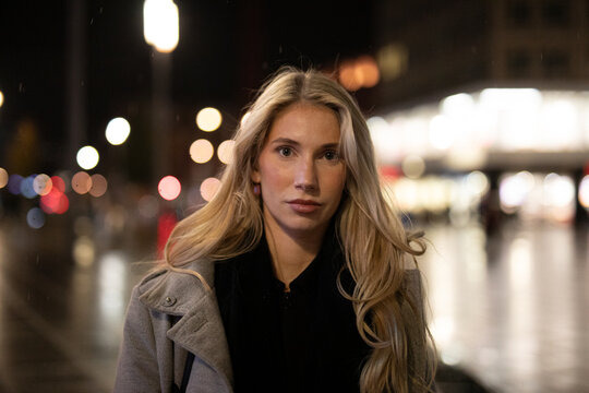 young woman in night city