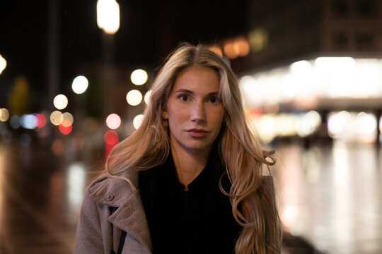 young woman in night city