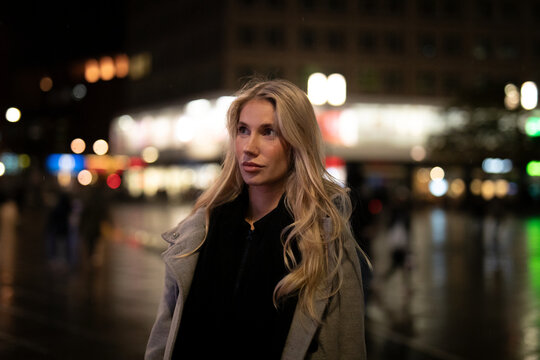 young woman walking in the city