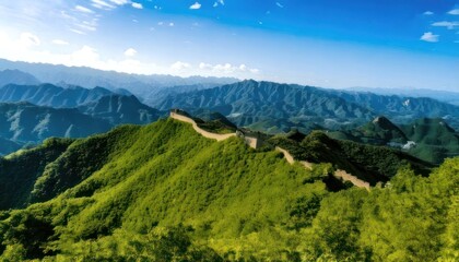 Fototapeta premium Majestic Great Wall of China winding through lush green mountains.