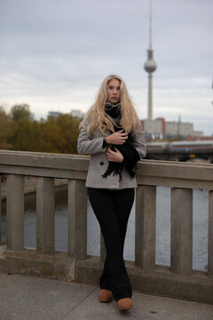 young woman sitting on a bench