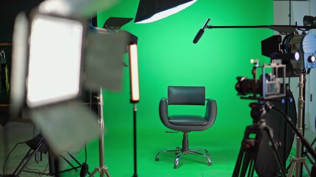 Empty chair in television studio green screen set
