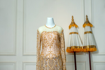 Elegant Gold Lace Modern Kebaya or Evening Gown with Copy Space
