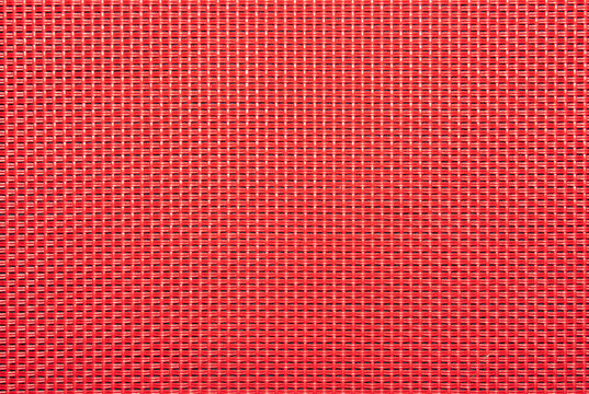 The texture is made of straw.Straw weave background.The texture of colored woven straw.Woven straw texture.