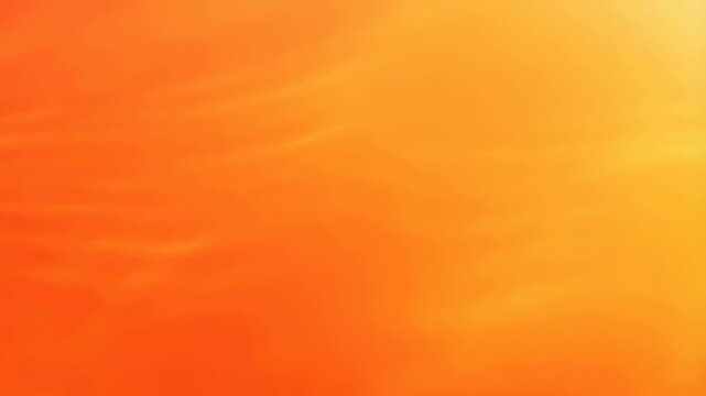 Abstract orange gradient background with soft waves. Ideal for creative projects, branding, and vibrant visual storytelling