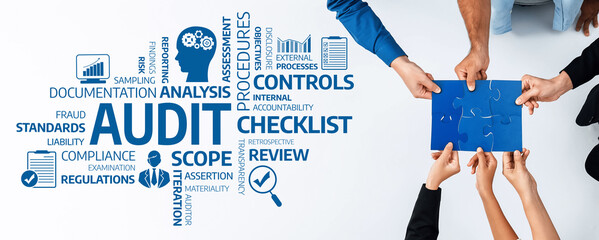 A group of hands engages in an audit process, symbolizing teamwork in financial assessment. The...