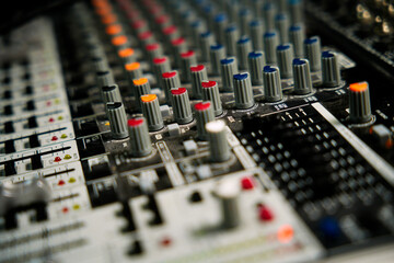 Audio mixer console producing sound in studio