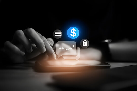 Businessman analyzing financial data on tablet with security and finance icons - Powered by Adobe