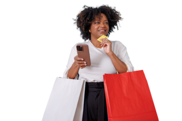 African american woman holding smartphone and credit card, shopping online with bags, transparent background
