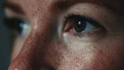 Close-up of Human Eye with Freckled Skin
