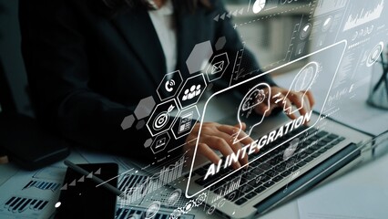 Professional businesswoman using laptop with AI integration graphics and data visualization for technology innovation in office environment. Asymptotic smart data analytic.