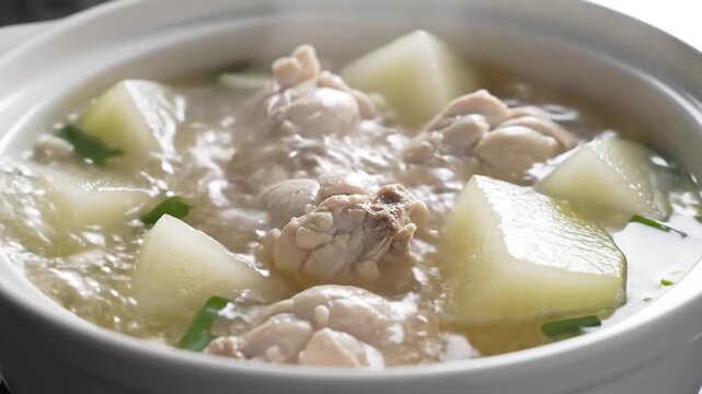 Delicious Chicken and Winter Melon Soup Simmering in a Pot.