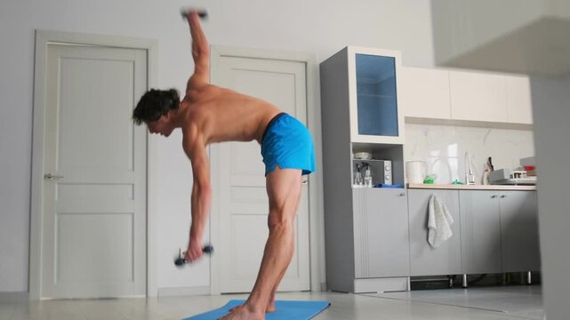 Gentle side stretch exercise, Athletic individual performing windmill stretch with proper form and control, Caucasian male executing precise windmill stretch focusing on balance and breath