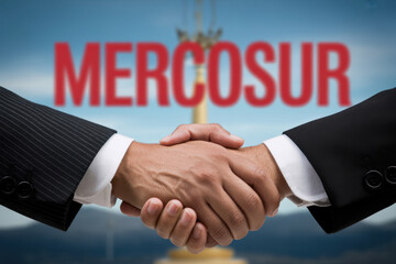 A handshake symbolizes the free trade agreement between the Mercosur countries and the European Union 
