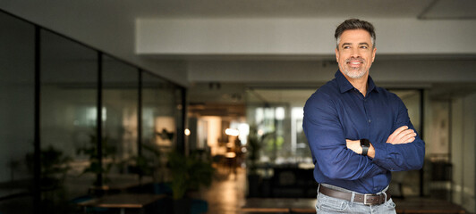 Happy mature 50 years old professional banker business owner man manager, smiling senior male ceo...