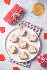 Salami sausage and cheese slices in the form of hearts and crackers for Valentine's day holidays