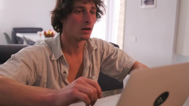 Frustrated technician troubleshooting, Business owner frustrated while attempting to fix his computer, Person experiencing technical difficulties at work with tense atmosphere and active gestures