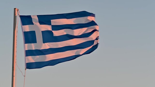 Greek flag in early morning light on Rhodes, Greece