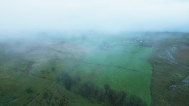 Aerial shot foggy day over Cawdale Beck in Brampton Cumbria UK 54.554784, -2.788044