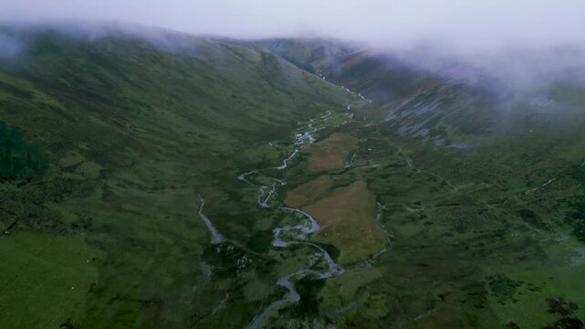 Aerial shot foggy day over Cawdale Beck in Brampton Cumbria UK 54.554784, -2.788044
