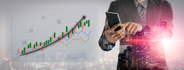 A business professional holds a smartphone while a financial growth chart is overlaid with a dynamic cityscape, symbolizing modern technology and success. Impute