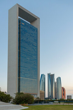 ADNOC Headquarters and Etihad Towers skyline at dusk in Abu Dhabi