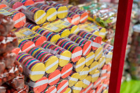 Colorful obleas at a traditional candy stall. Also known as morelianas or communion wafers. Petatlan, Guerrero, Mexico, January 16, 2026.