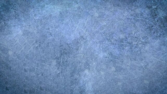 scratched rough surface texture of white scratches on an icy wintry blue background with a rapid stop motion strobed style animation 4K video overlay effect