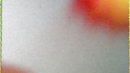 Retro film texture background with grain, dust and light leak. Analog film burn effect image