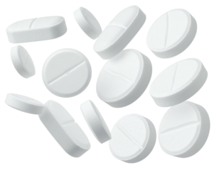 White pills with scoring float against a black background