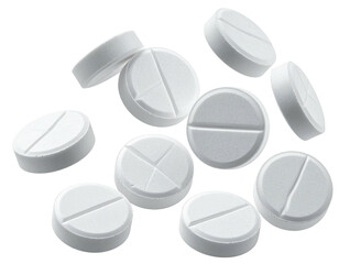 White round pills, some scored, isolated on black