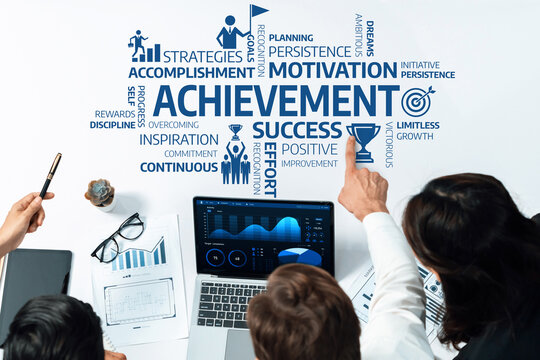 This stock image showcases motivational concepts around achievement and success, featuring data analysis and collaborative efforts among professionals. Amity