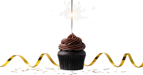 A single dark chocolate cupcake with rich swirled frosting is adorned with a lit sparkler and surrounded by golden ribbon and confetti dessert sweet cream transparent background