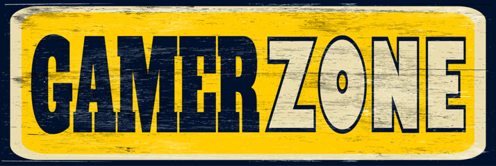 Aged and worn gamer zone sign on wood