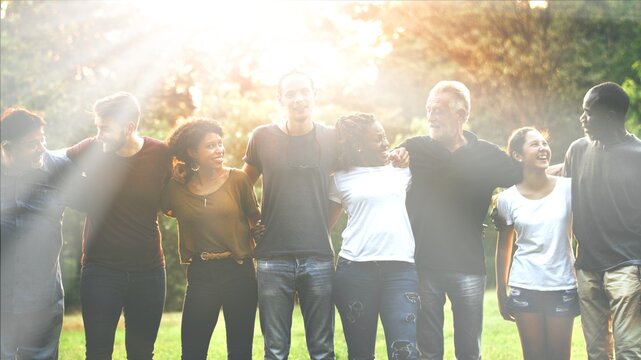 Happiness group of people huddle and smiling together