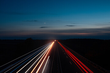 Fototapeta premium Light trails at night on a highway