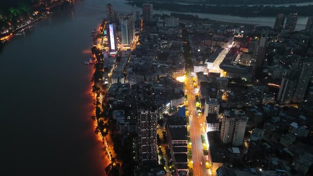 Leshan Sichuan Night City Aerial View with River and Urban Lighting