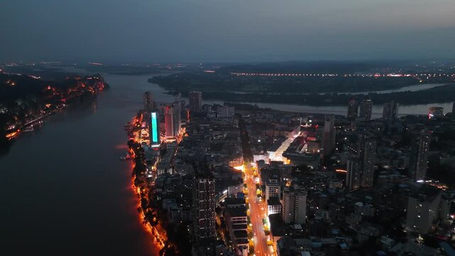 Leshan Sichuan Night Cityscape with Riverside Lighting and Urban Glow
