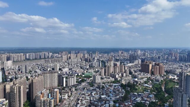 Leshan Cityscape with Blue Sky and White Clouds, Sichuan China