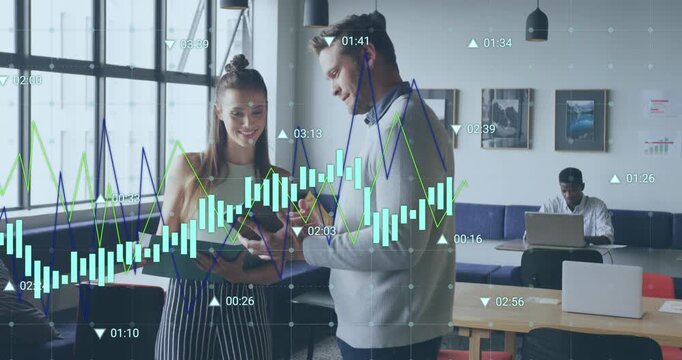 Man tapping tablet and woman pointing folder in office, animated finance graphs revealing insights