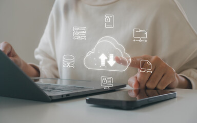 Cloud computing storage technology concept. Woman working laptop with upload download icon, secure cloud system, digital, online data backup, network infrastructure, modern business data management.