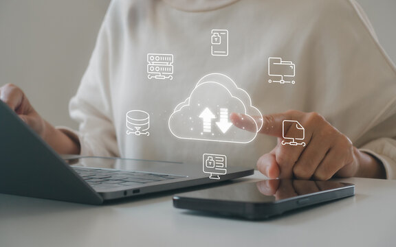 Cloud computing storage technology concept. Woman working laptop with upload download icon, secure cloud system, digital, online data backup, network infrastructure, modern business data management. - Powered by Adobe
